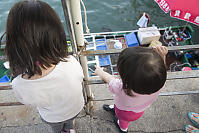 Claira And Nara Looking At Fishing Boats