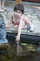 Claira With Her Fingers In The Pond