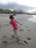 Claira Running Up The Beach