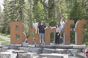 Family At Banff Sign