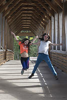 Kids Jumping On Bridge