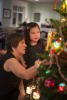 Nara And Grandma Close To Christmas Tree