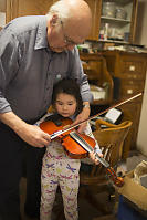 Grandpa Giving Fiddle Lessons
