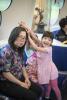 Kids Helping Mom On The Train