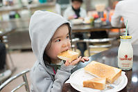 Nara Eating Peanut Butter Toast In Hong Kong Cafe