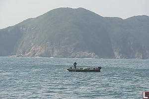 Fisherman Pulling Up Net