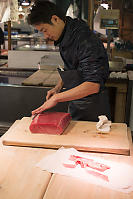 Trimming Slab Of Tuna