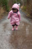 Nara Splashing Through Puddle