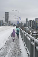 Walking Over Bridge To Work