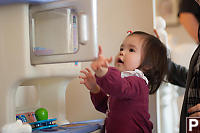 Nara Playing In Kitchen