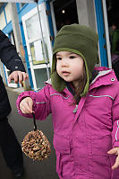 Nara Holding Her Bird Feeder