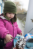 Nara Putting Crisco On Pine Cone