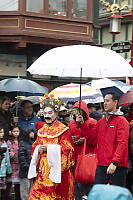 God Of Wealth With Umbrella