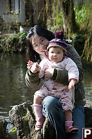 Nara And Helen Sitting On Rock