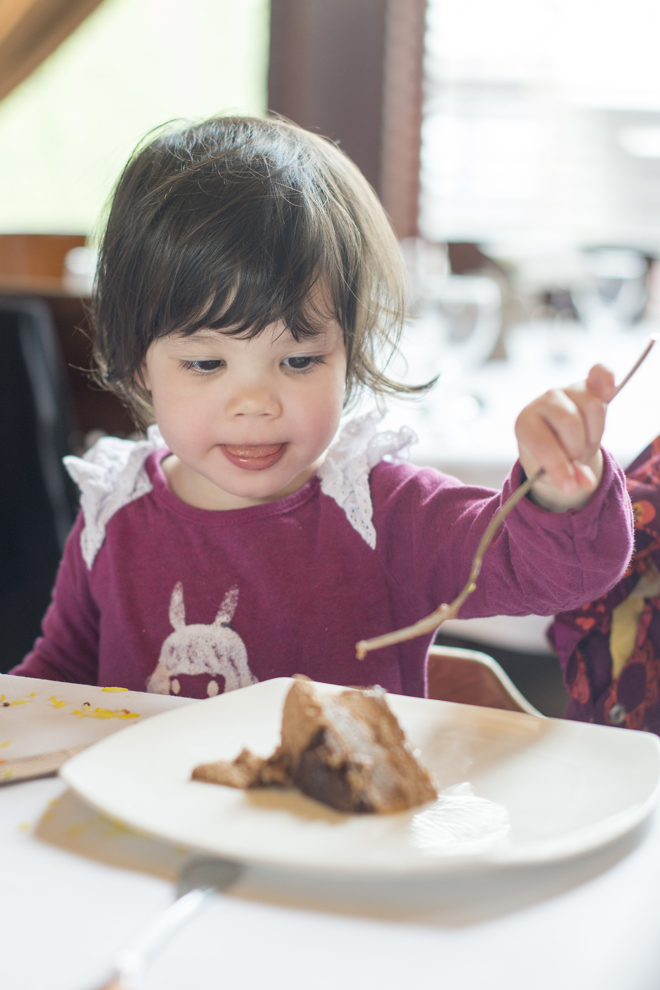 l figure eating cake