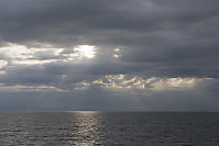 Rays Through The Holes In The Clouds