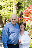 Parents With Plants Behind