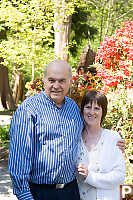 Parents With Plants Behind
