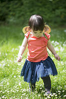 Claira Tramping Through Daisies