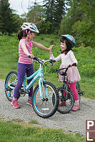 High Five For Riding Her Bike