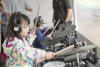 Claira Playing Drums