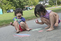 Claira And Nara Drawing With Chalk