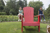 Sitting On Arms Of Giant Chair