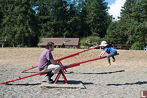 Nara And John On Teeter Totter Hg