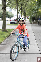 Claira Riding Her Bike