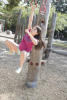 Nara Swinging Between Grips