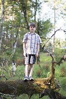 James Standing On Fallen Tree