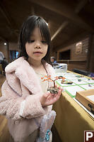 Claira Looking At Wire Tree