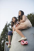 Kids On Top Of Climbing Wall