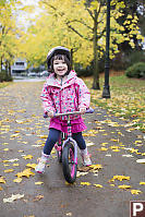 Claira On Her Kick Bike