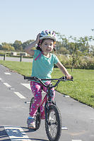 Nara Holding Her Helmet While Riding