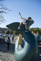 Nara Sitting On Cadborosaurus
        Tail