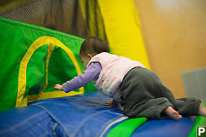 Claira ICrawling Into The Bouncy Castle