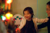 Nara Smiling At Christmas Tree