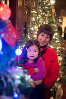 Nara And Grandma In Front Of Christmas Tree