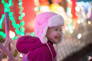 Claira Outside Gingerbread House