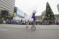 Unicycle Entertaining Crowd