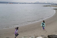 Sandy Beach With Vancouver Behind