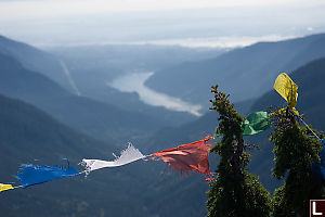 Budhist Prayer Flags With AView Of Vancouver