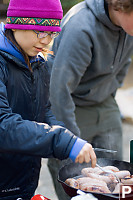 Helen Cooking Sausages