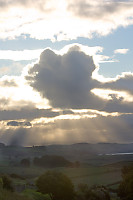 Sunburst Over Hills