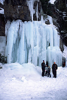 Family in Front of Ice Falls