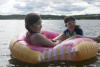 Riding Floaty In Lake