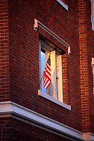 Flag on Brick Building