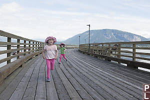 Nara And Claira On Pier Running