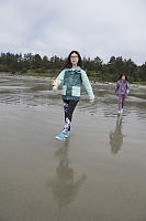 Big Reflections On The Beach